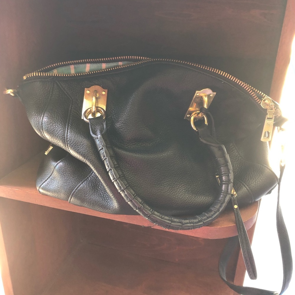 Steven by Steve Madden handles and shoulder strap